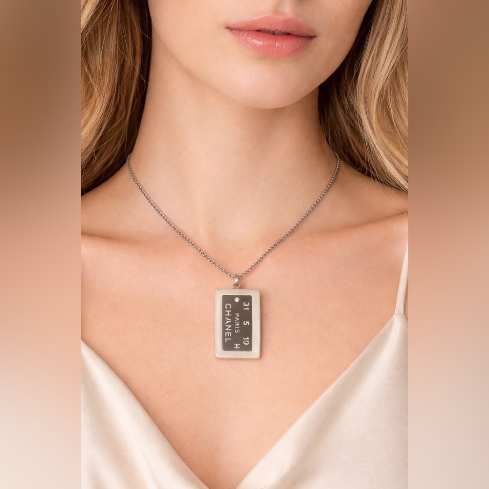 Chanel Silver and White Pearlescent Pendant Necklace - Picture 1 of 8